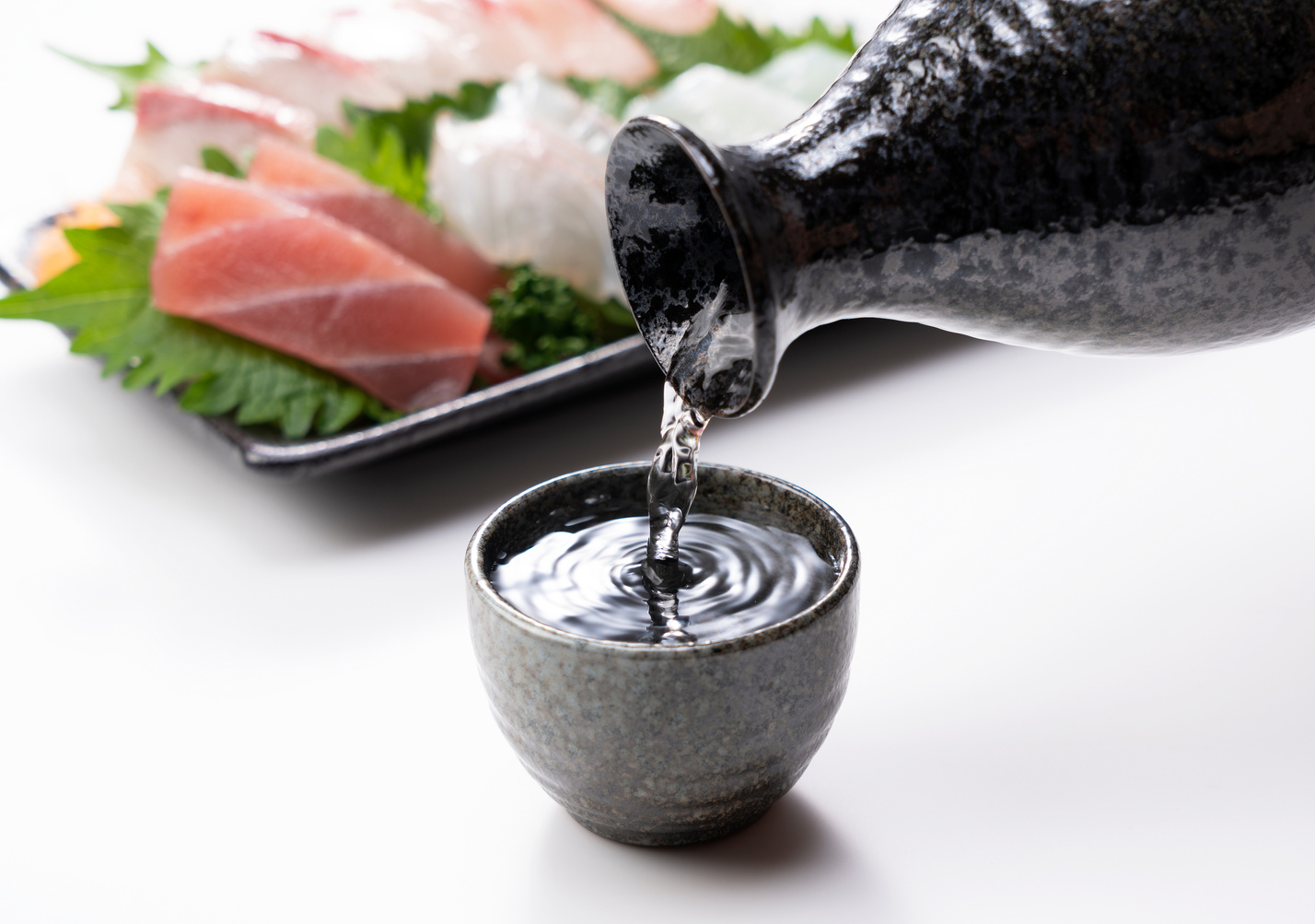 Pouring a Glass of Sake